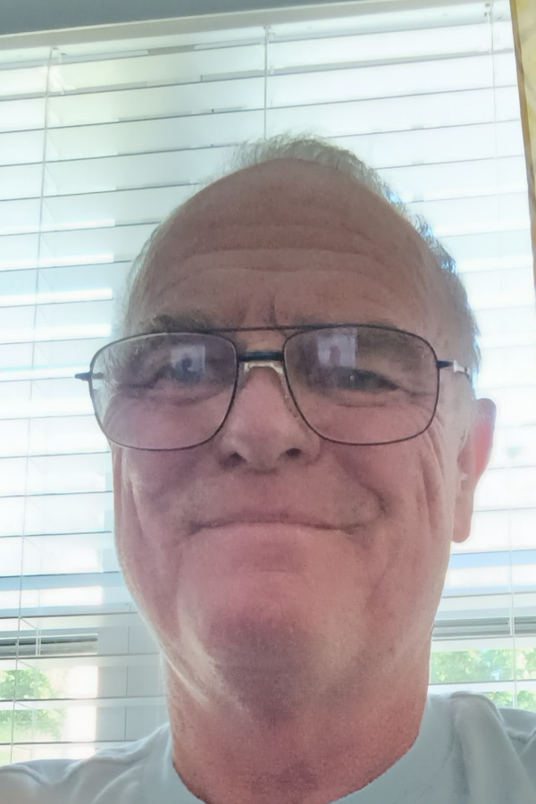 Cruise Brothers Travel Agent John Hammond